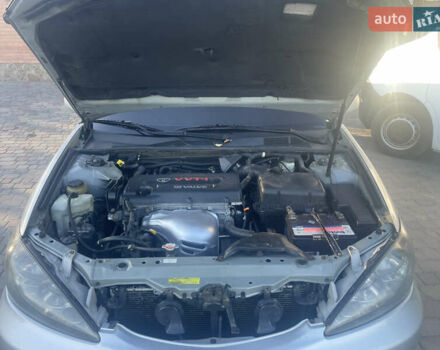 Серый Тойота Камри, объемом двигателя 2.4 л и пробегом 469 тыс. км за 6200 $, фото 32 на Automoto.ua