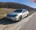 Серый Тойота Камри, объемом двигателя 2.4 л и пробегом 340 тыс. км за 5000 $, фото 1 на Automoto.ua