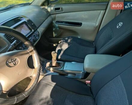 Серый Тойота Камри, объемом двигателя 2.36 л и пробегом 308 тыс. км за 4500 $, фото 7 на Automoto.ua