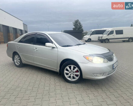 Серый Тойота Камри, объемом двигателя 2.4 л и пробегом 469 тыс. км за 6200 $, фото 1 на Automoto.ua