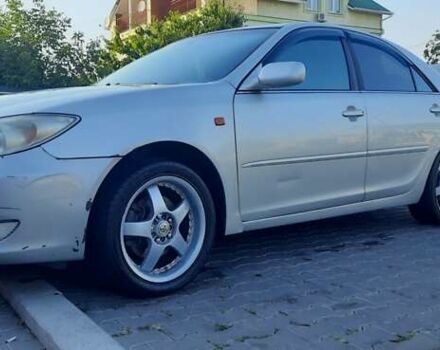 Серый Тойота Камри, объемом двигателя 3 л и пробегом 398 тыс. км за 4900 $, фото 1 на Automoto.ua