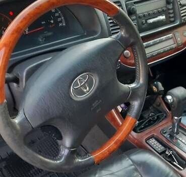 Серый Тойота Камри, объемом двигателя 3 л и пробегом 398 тыс. км за 4900 $, фото 5 на Automoto.ua