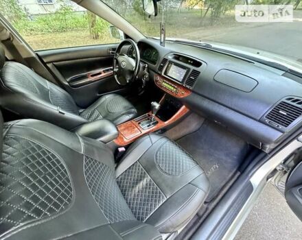 Серый Тойота Камри, объемом двигателя 2.36 л и пробегом 213 тыс. км за 6300 $, фото 46 на Automoto.ua