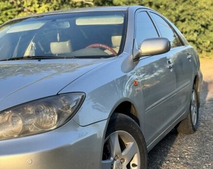 Серый Тойота Камри, объемом двигателя 2.4 л и пробегом 265 тыс. км за 6000 $, фото 3 на Automoto.ua