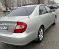 Серый Тойота Камри, объемом двигателя 2.4 л и пробегом 301 тыс. км за 6900 $, фото 1 на Automoto.ua