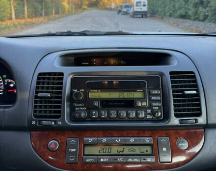 Серый Тойота Камри, объемом двигателя 2.4 л и пробегом 42 тыс. км за 10900 $, фото 87 на Automoto.ua