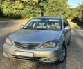 Сірий Тойота Камрі, об'ємом двигуна 2.4 л та пробігом 265 тис. км за 6000 $, фото 1 на Automoto.ua