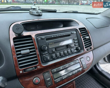 Серый Тойота Камри, объемом двигателя 2.36 л и пробегом 220 тыс. км за 6200 $, фото 45 на Automoto.ua