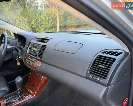 Серый Тойота Камри, объемом двигателя 2.4 л и пробегом 42 тыс. км за 10900 $, фото 113 на Automoto.ua