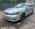 Серый Тойота Камри, объемом двигателя 3 л и пробегом 310 тыс. км за 5200 $, фото 1 на Automoto.ua