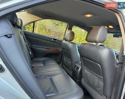 Серый Тойота Камри, объемом двигателя 2.4 л и пробегом 42 тыс. км за 10900 $, фото 105 на Automoto.ua