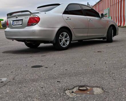 Сірий Тойота Камрі, об'ємом двигуна 3 л та пробігом 317 тис. км за 7700 $, фото 26 на Automoto.ua