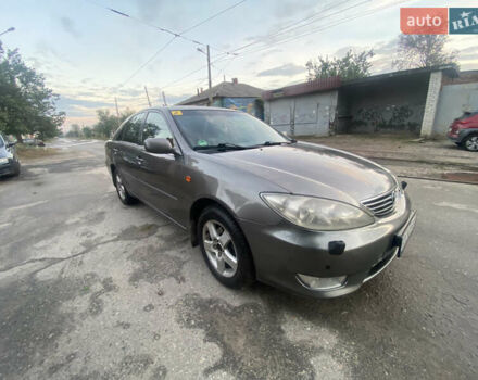 Серый Тойота Камри, объемом двигателя 3 л и пробегом 230 тыс. км за 5500 $, фото 5 на Automoto.ua