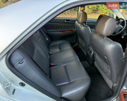 Серый Тойота Камри, объемом двигателя 2.4 л и пробегом 42 тыс. км за 10900 $, фото 103 на Automoto.ua