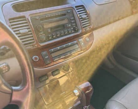 Серый Тойота Камри, объемом двигателя 2.4 л и пробегом 265 тыс. км за 6000 $, фото 7 на Automoto.ua