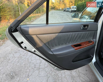 Серый Тойота Камри, объемом двигателя 2.4 л и пробегом 42 тыс. км за 10900 $, фото 94 на Automoto.ua