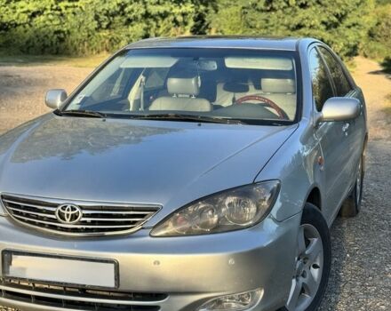 Серый Тойота Камри, объемом двигателя 2.4 л и пробегом 265 тыс. км за 6000 $, фото 2 на Automoto.ua