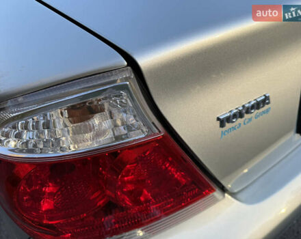 Серый Тойота Камри, объемом двигателя 2.4 л и пробегом 42 тыс. км за 10900 $, фото 41 на Automoto.ua