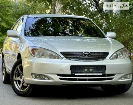 Серый Тойота Камри, объемом двигателя 2.36 л и пробегом 213 тыс. км за 6300 $, фото 29 на Automoto.ua