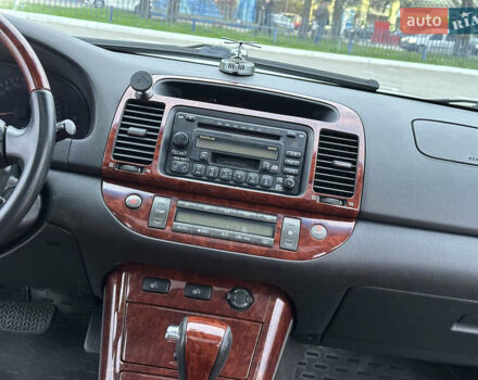 Серый Тойота Камри, объемом двигателя 2.36 л и пробегом 220 тыс. км за 6200 $, фото 30 на Automoto.ua