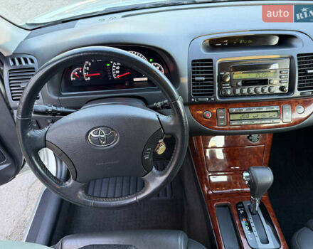 Серый Тойота Камри, объемом двигателя 2.4 л и пробегом 42 тыс. км за 10900 $, фото 86 на Automoto.ua