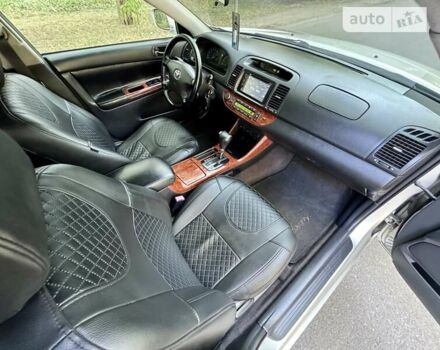 Серый Тойота Камри, объемом двигателя 2.36 л и пробегом 213 тыс. км за 6300 $, фото 47 на Automoto.ua