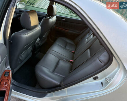 Серый Тойота Камри, объемом двигателя 2.4 л и пробегом 42 тыс. км за 10900 $, фото 95 на Automoto.ua