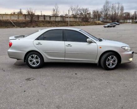 Сірий Тойота Камрі, об'ємом двигуна 3 л та пробігом 317 тис. км за 7700 $, фото 1 на Automoto.ua