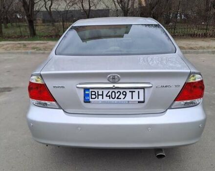 Серый Тойота Камри, объемом двигателя 2.4 л и пробегом 245 тыс. км за 7500 $, фото 1 на Automoto.ua