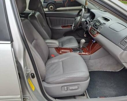 Серый Тойота Камри, объемом двигателя 2.4 л и пробегом 245 тыс. км за 7500 $, фото 4 на Automoto.ua