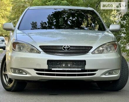 Серый Тойота Камри, объемом двигателя 2.36 л и пробегом 213 тыс. км за 6300 $, фото 30 на Automoto.ua