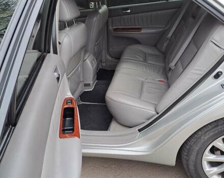 Серый Тойота Камри, объемом двигателя 2.4 л и пробегом 245 тыс. км за 7500 $, фото 5 на Automoto.ua