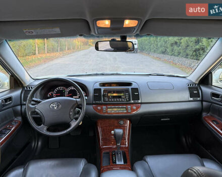 Серый Тойота Камри, объемом двигателя 2.4 л и пробегом 42 тыс. км за 10900 $, фото 101 на Automoto.ua