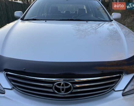 Серый Тойота Камри, объемом двигателя 2.4 л и пробегом 42 тыс. км за 10900 $, фото 29 на Automoto.ua