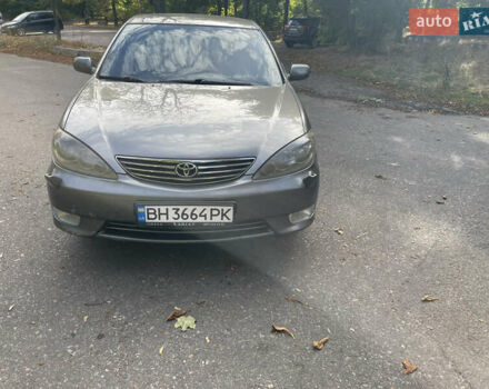 Сірий Тойота Камрі, об'ємом двигуна 2.36 л та пробігом 240 тис. км за 5299 $, фото 2 на Automoto.ua