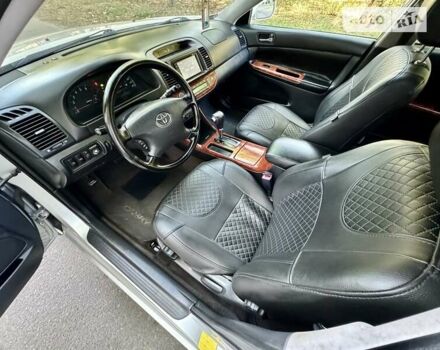 Серый Тойота Камри, объемом двигателя 2.36 л и пробегом 213 тыс. км за 6300 $, фото 39 на Automoto.ua