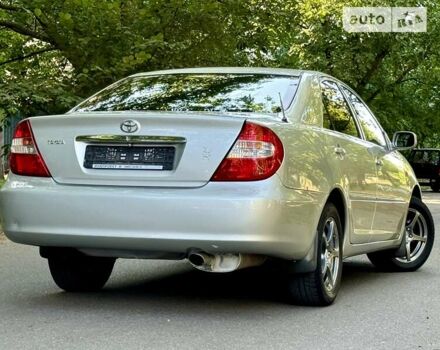 Серый Тойота Камри, объемом двигателя 2.36 л и пробегом 213 тыс. км за 6300 $, фото 26 на Automoto.ua