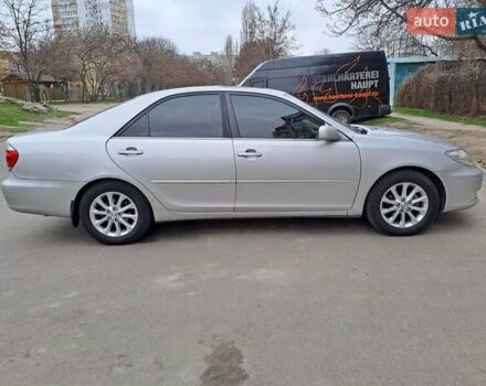 Серый Тойота Камри, объемом двигателя 2.4 л и пробегом 245 тыс. км за 7500 $, фото 3 на Automoto.ua