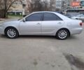 Серый Тойота Камри, объемом двигателя 2.4 л и пробегом 245 тыс. км за 7500 $, фото 2 на Automoto.ua