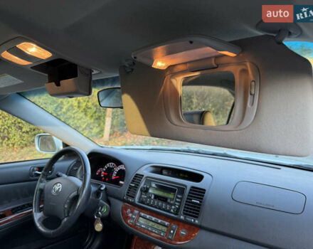 Серый Тойота Камри, объемом двигателя 2.4 л и пробегом 42 тыс. км за 10900 $, фото 114 на Automoto.ua