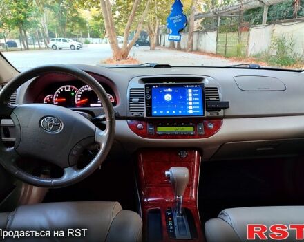 Серый Тойота Камри, объемом двигателя 2.4 л и пробегом 185 тыс. км за 7999 $, фото 8 на Automoto.ua