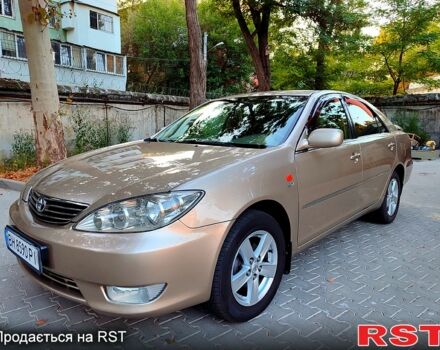 Серый Тойота Камри, объемом двигателя 2.4 л и пробегом 185 тыс. км за 7999 $, фото 1 на Automoto.ua