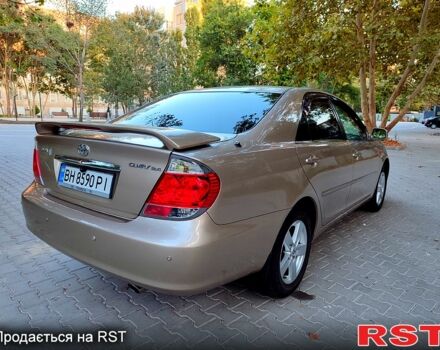 Серый Тойота Камри, объемом двигателя 2.4 л и пробегом 185 тыс. км за 7999 $, фото 4 на Automoto.ua