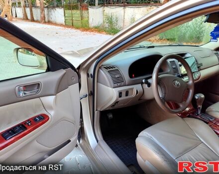 Серый Тойота Камри, объемом двигателя 2.4 л и пробегом 185 тыс. км за 7999 $, фото 5 на Automoto.ua