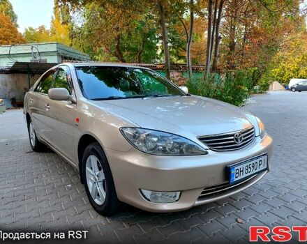 Серый Тойота Камри, объемом двигателя 2.4 л и пробегом 185 тыс. км за 7999 $, фото 2 на Automoto.ua