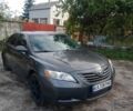 Сірий Тойота Камрі, об'ємом двигуна 2.4 л та пробігом 240 тис. км за 6040 $, фото 1 на Automoto.ua