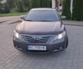 Серый Тойота Камри, объемом двигателя 2.4 л и пробегом 290 тыс. км за 6600 $, фото 1 на Automoto.ua
