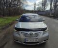 Сірий Тойота Камрі, об'ємом двигуна 2.4 л та пробігом 247 тис. км за 10500 $, фото 1 на Automoto.ua