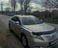 Сірий Тойота Камрі, об'ємом двигуна 2.4 л та пробігом 247 тис. км за 10500 $, фото 1 на Automoto.ua