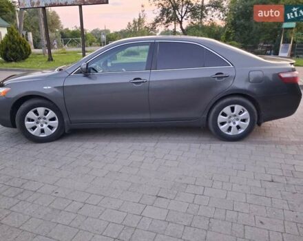 Серый Тойота Камри, объемом двигателя 2.4 л и пробегом 290 тыс. км за 6600 $, фото 1 на Automoto.ua